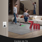 Two people using a vacuum cleaner with a 7m cord in a living room setting.