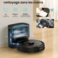 Robotic vacuum cleaner with self-emptying station on a wooden floor, highlighting features like dust collection and cleaning duration.
